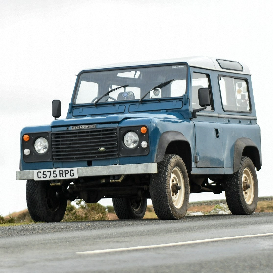 Vintage Land Rover Defender with RHD Bangin Headlights Traditional 7 inch LED